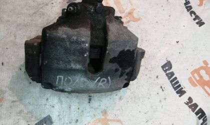 Суппорт тормозной передний правый Volkswagen Polo