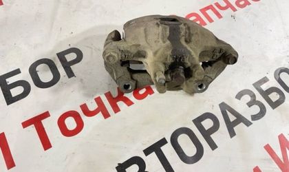 Суппорт тормозной передний левый Mitsubishi Lancer