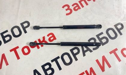 Амортизатор капота Mitsubishi Lancer седан 2.0