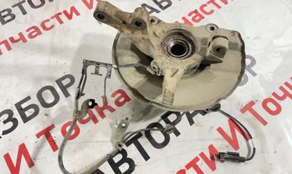 Кулак поворотный передний левый Mitsubishi Lancer