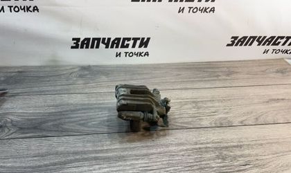 Суппорт тормозной задний левый Volkswagen Polo