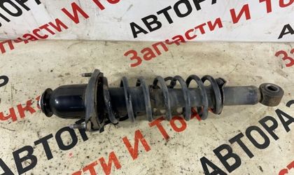 Стойка подвески задняя правая Toyota Corolla 120