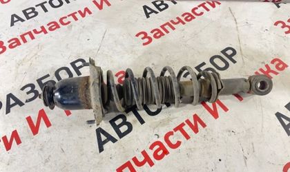 Стойка подвески задняя левая Toyota Corolla 120