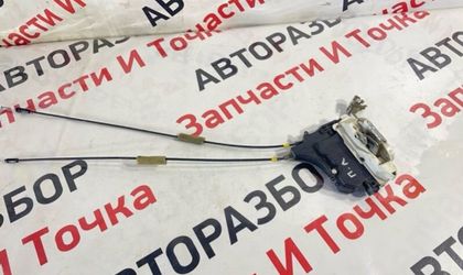Замок боковой двери передний левый Mitsubishi