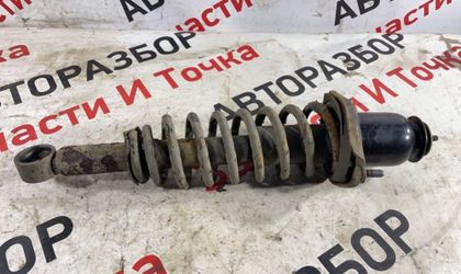 Стойка подвески задняя левая Geely Emgrand 7 EC7