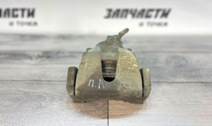 Суппорт тормозной передний левый Mazda Axela BK5P