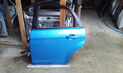 Дверь левая задняя в сборе Ford Focus II Рестайлинг
