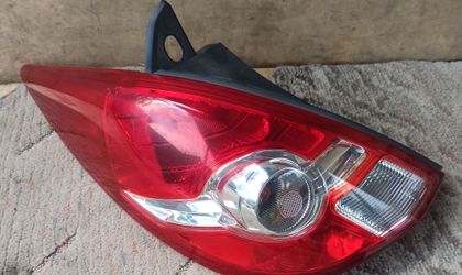 Стоп фонарь Nissan Tiida c11 левый