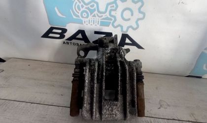 Суппорт тормозной задний правый Skoda Rapid I ...