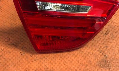 Фонарь крышки багажника левый BMW 3 7289427