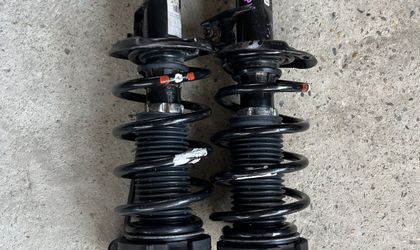 Стойка амортизатора передняя Volkswagen Passat B6