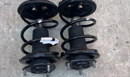 Стойка амортизатора передняя Toyota RAV4 ACA21