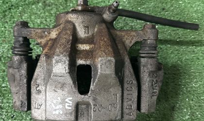 Суппорт тормозной передний левый Axio/Fielder E144