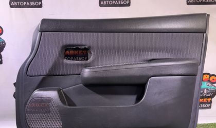 Обшивка двери передней правой Nissan Tiida C11
