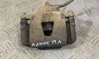 Суппорт передний левый Chevrolet Lanos