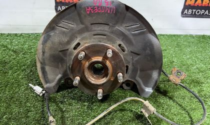 Поворотный кулак левый Subaru Impreza III 2009