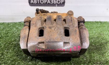 Суппорт тормозной передний левый Subaru Impreza gh