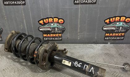 Стойка передняя левая Volkswagen Passat B6