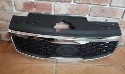 Решетка радиатора Kia Rio II  2009 - 2011