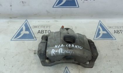 Суппорт тормозной передний правый Kia Cerato I 