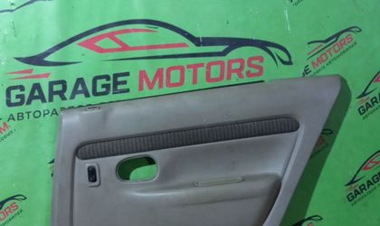 Обшивка двери задней правой Mazda Demio I DW 1999