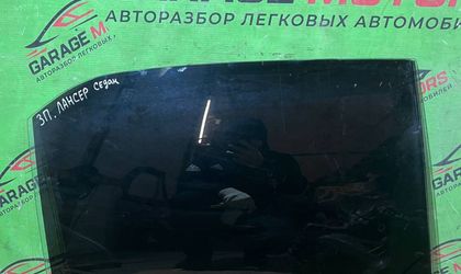Стекло двери задней правой Mitsubishi Lancer 9 сед
