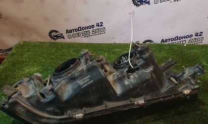 Фара левая Mitsubishi Diamante, I 1990