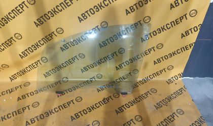 Стекло двери передней левой Mitsubishi Colt Z25A