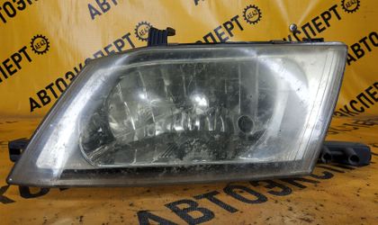 Фара левая 1633 Nissan Wingroad Y11