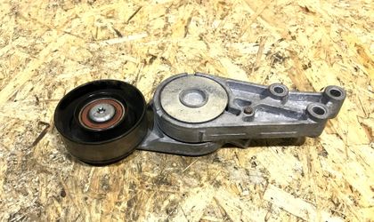 Натяжитель ремня генератора Audi  06B903133E