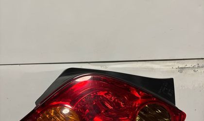 Фонарь задний левый Toyota Ist 