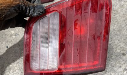 Фонарь крышки багажника левый Универсал E-К...