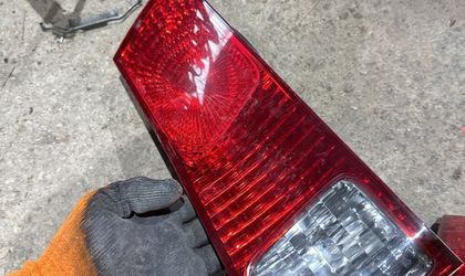 Фонарь крышки багажника левый Toyota Camry XV2...