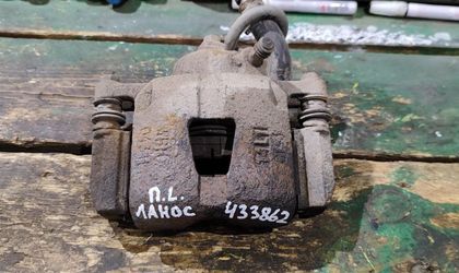 Суппорт тормозной передний левый Chevrolet Lanos I
