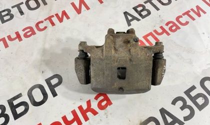 Суппорт тормозной передний левый Mitsubishi Lancer