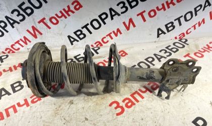 Стойка подвески передняя левая Nissan Cefiro A33