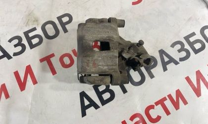 Суппорт тормозной задний правый Ford Focus CB8