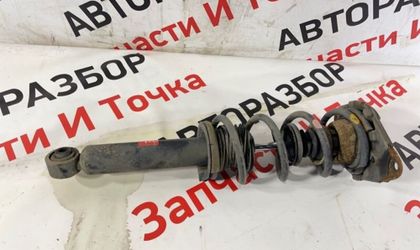 Стойка подвески задняя левая Nissan Primera P12