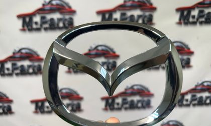 Эмблема решетки радиатора Mazda CX-5 KE дорестайлинг 