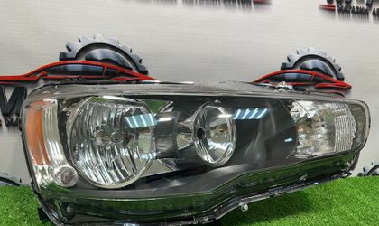 Фара правая Mitsubishi Lancer 10