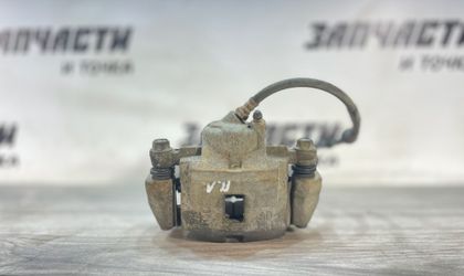 Суппорт тормозной передний левый Kia Spectra I...