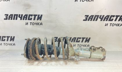 Стойка амортизатора передняя левая Kia Spectra...