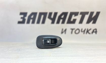 Кнопка стеклоподъемника  перед .правKia Spectra...